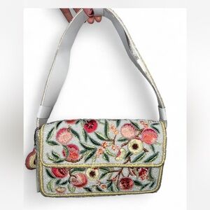 pink and yellow peach beaded shoulder bag with peach bag charm made in india